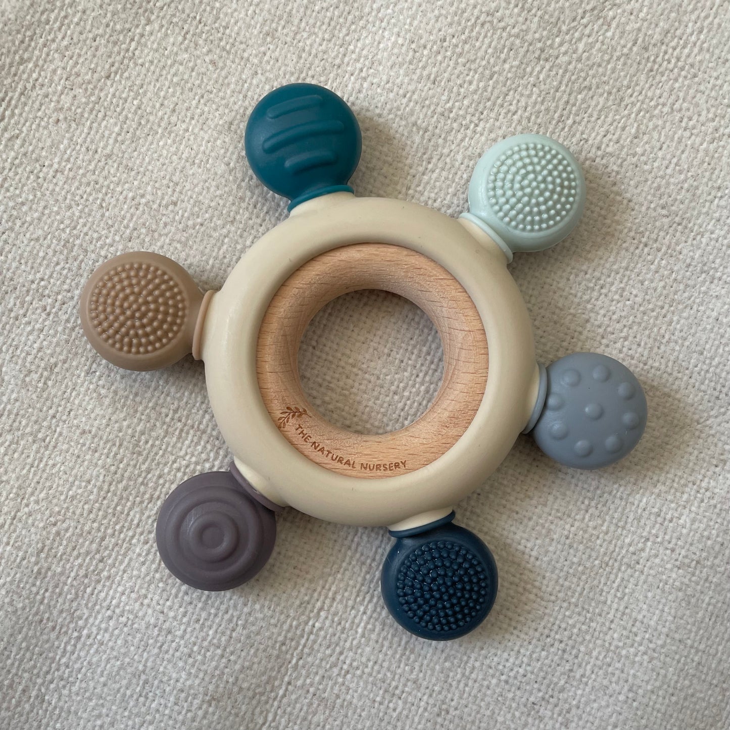 Textured silicone and wood teether - blue mix