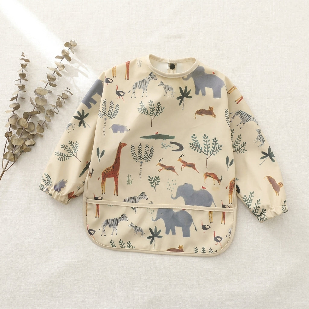 Safari weaning apron on linen — Natural Nursery baby weaning apron