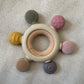 Textured silicone and wood teether - pink mix